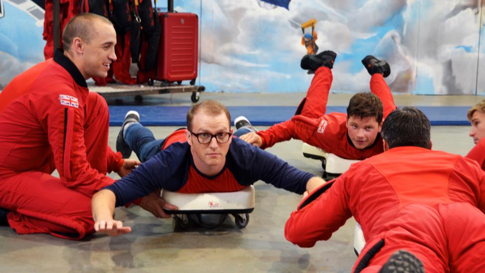 Ricky forms a skydive formation with the Red Devils.