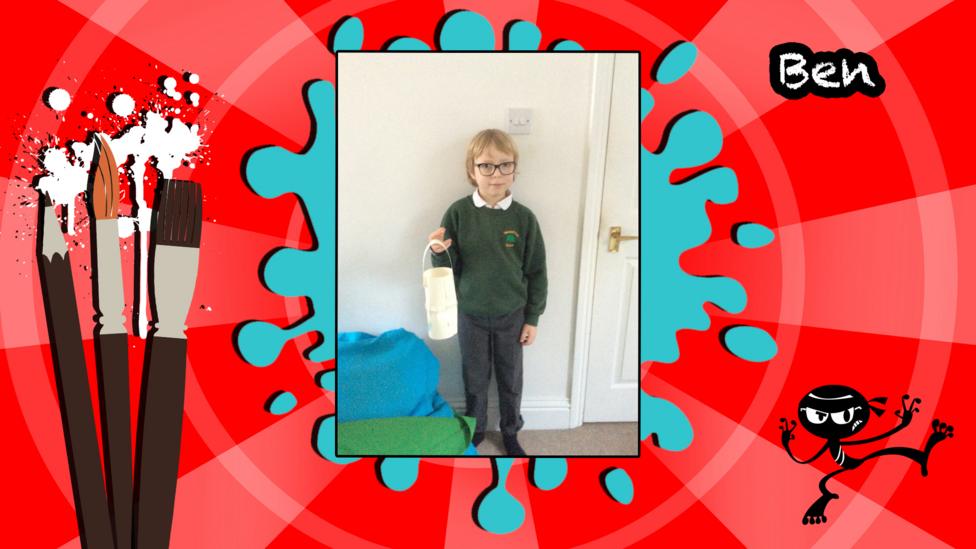 An image of a boy holding a homemade chinese lantern.