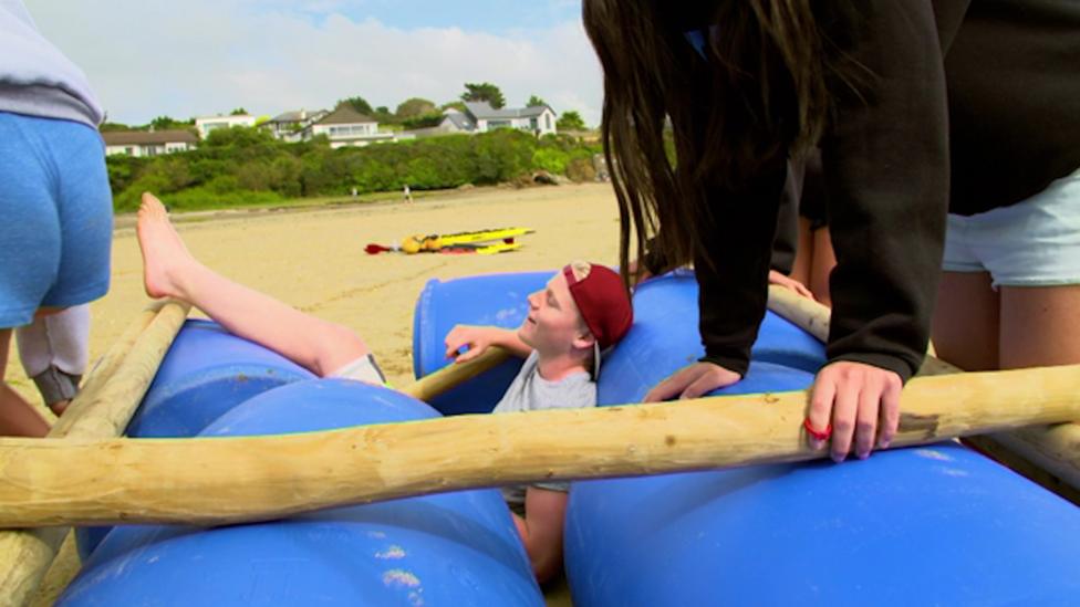 Jack building a raft