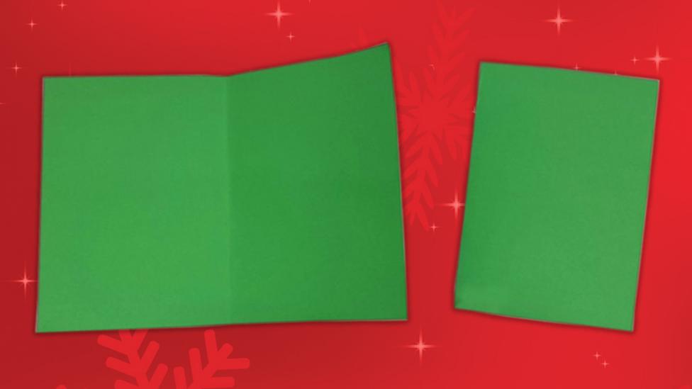 Green Christmas card with henry the dog on it.