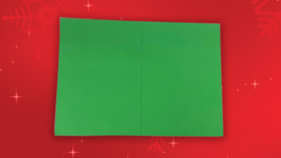 Green Christmas card with henry the dog on it.