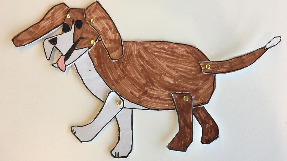 A cut out oh Henry the Blue Peter dog.