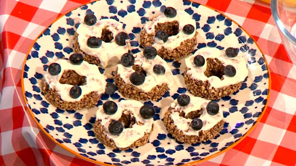 Richie and Henry the dog with some doggy treats