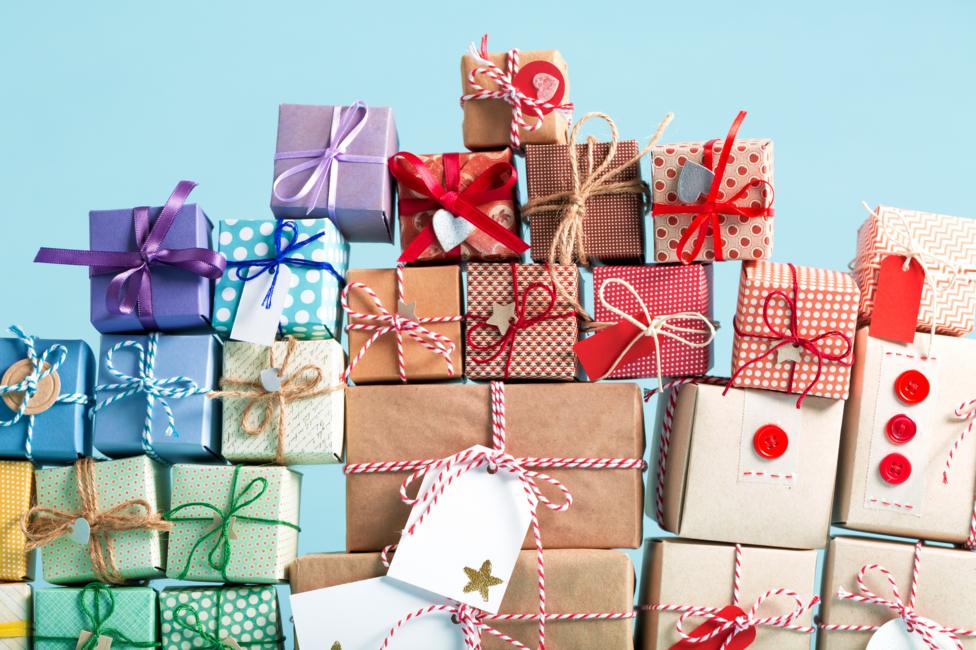 Rows and rows of Christmas presents placed on top of each other.