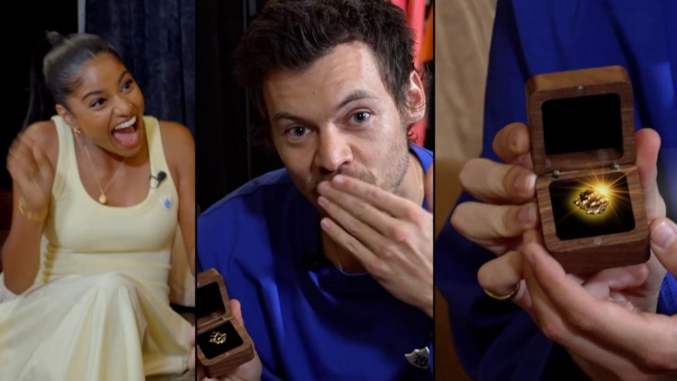 Shini meets Harry Styles and gives him a gold Blue Peter badge.