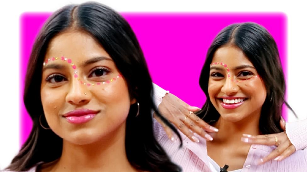 Shini wearing glittery festival themed make-up.