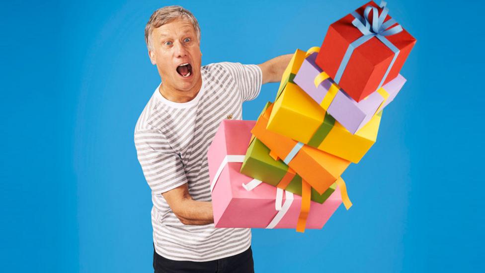 Peter Duncan with presents.