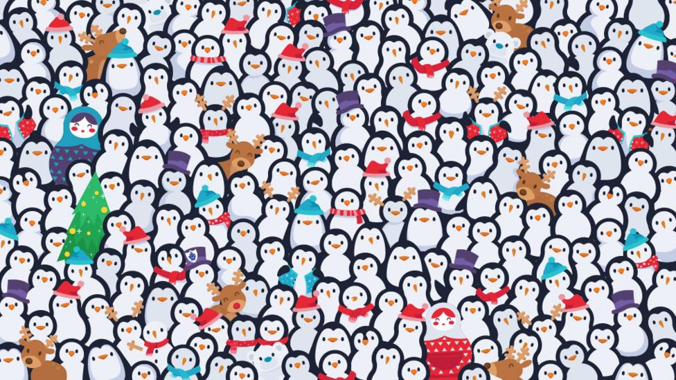 A hundred penguins with a snowman hiding amongst them.