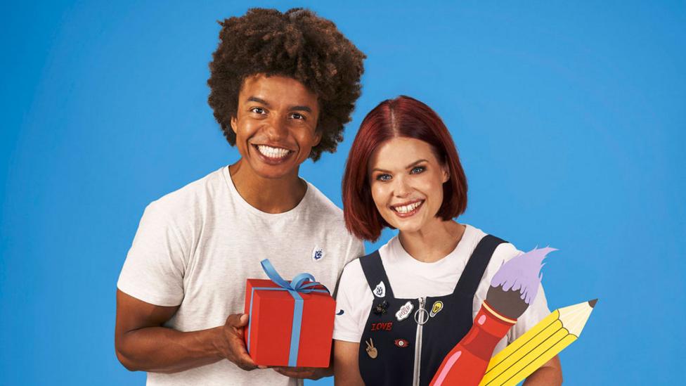 Lindsey and Radzi smiling.