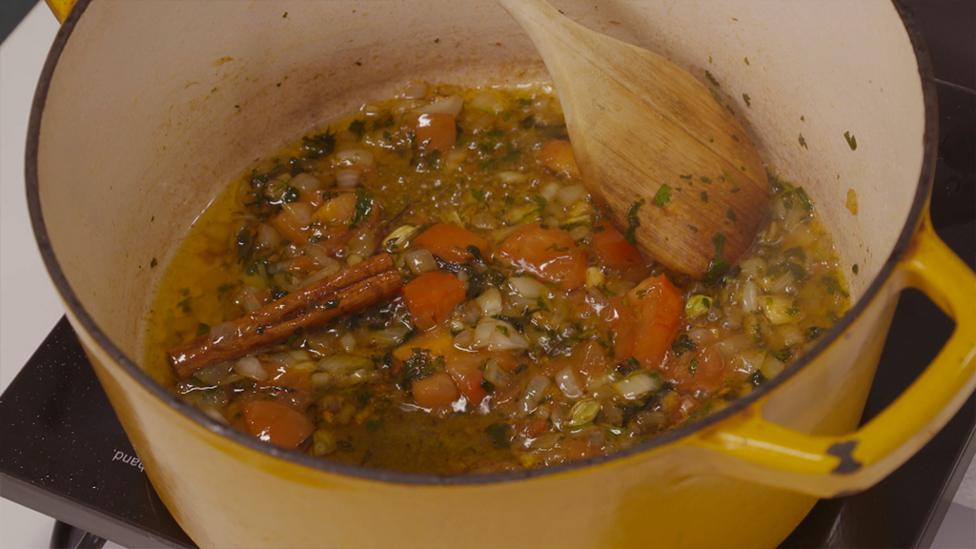 Somali Rice in cooking in a pan.