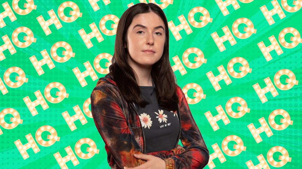 Bec from The Dumping Ground on a CBBC HQ Background.