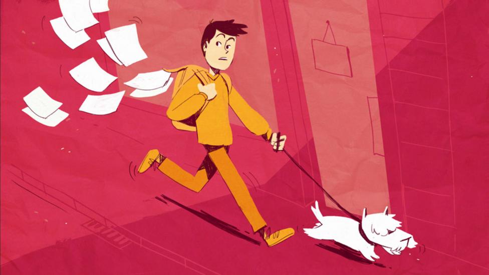 A boy being dragged along the road by his dog