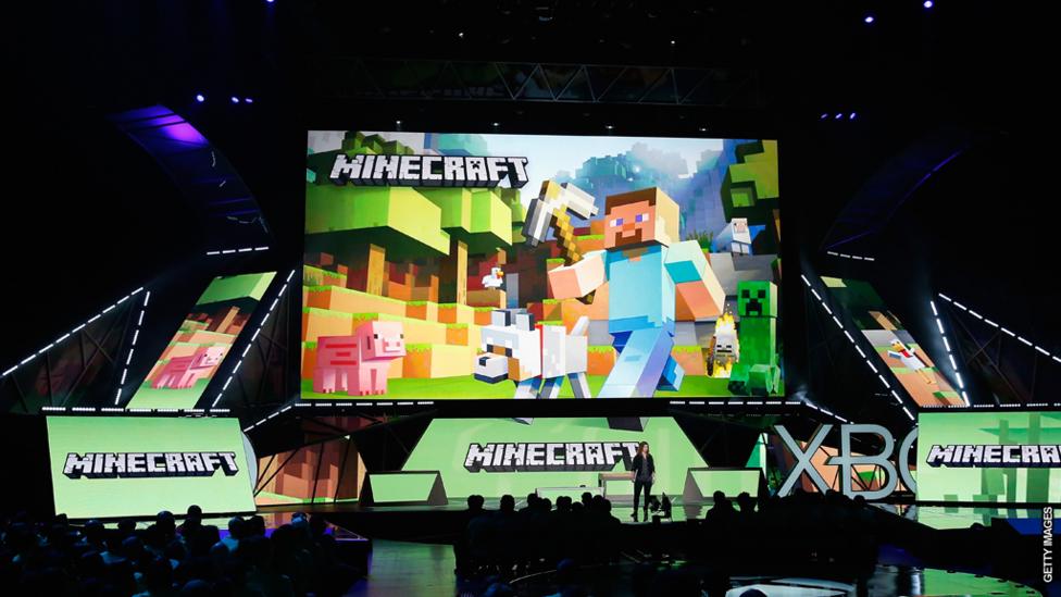A Minecraft logo on a big screen at E3.