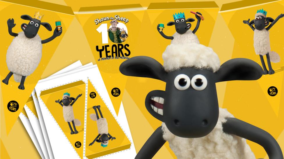 Shaun teh Sheep with his thumbs up in front of bunting.