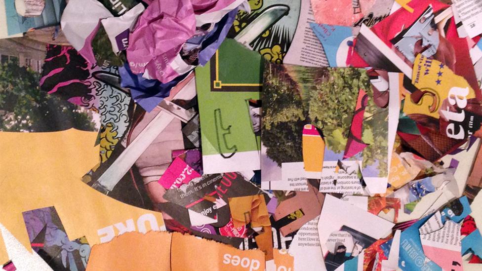 A pile of newspapers with letters cut out of them.