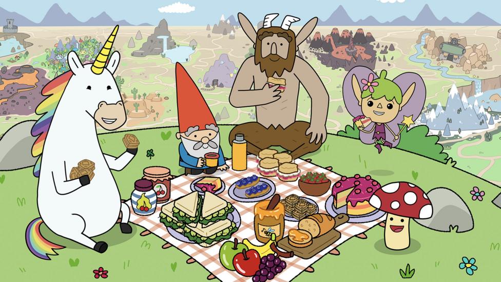 Animated characters from Super Happy Magic Forest gather around a picnic blanket in a field with lots of picnic food