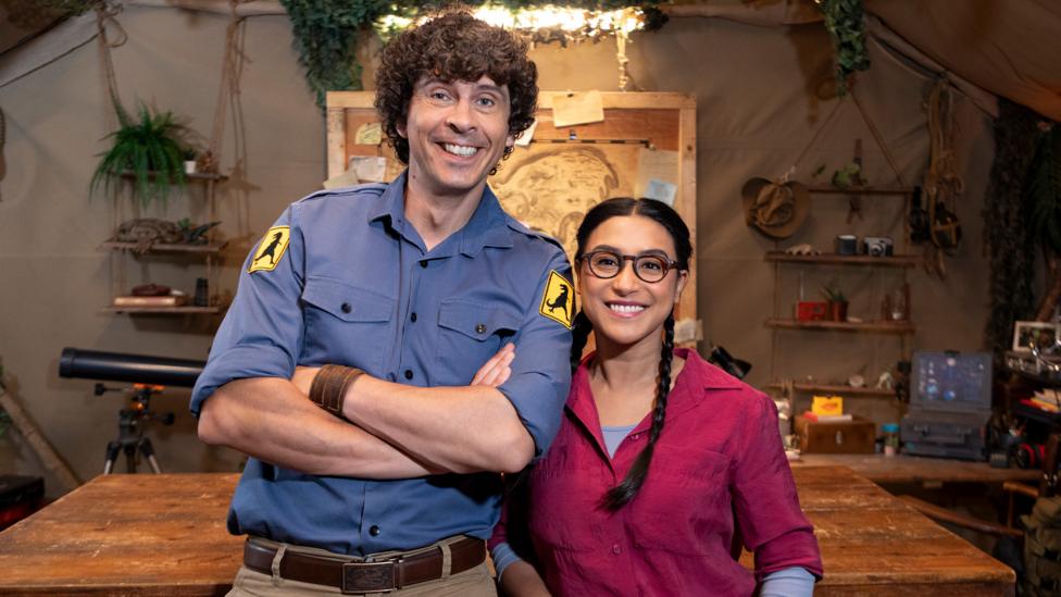 Image of Andy and Jen smiling and looking at the camera.