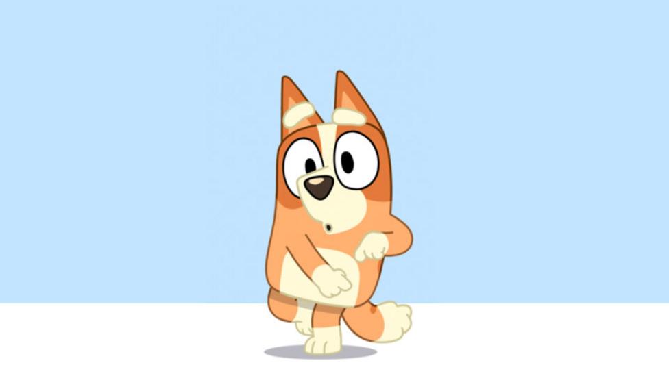 A cute cartoon Red Heeler puppy.
