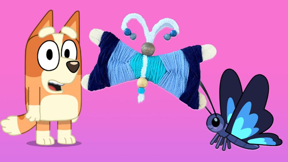 Image of Bingo and Flappy the butterfly with a handmade blue butterfly made out of beads and cotton thread