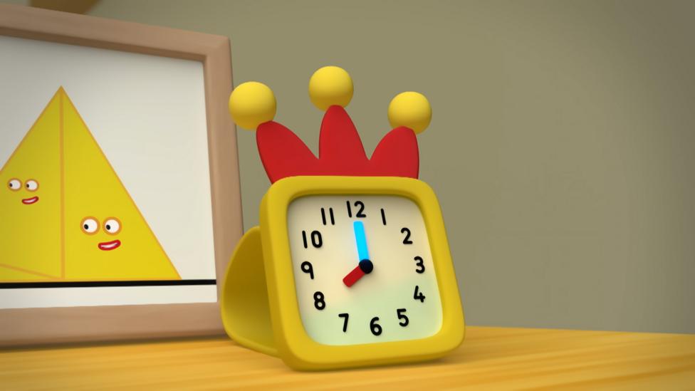 A clockface with the big hand pointing straight up, and the little hand pointing to number 8.