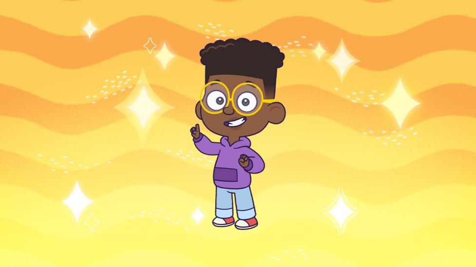 Finn is a bookish, neat, black seven-year-old, wearing gold glasses, purple hoodies and trainers.