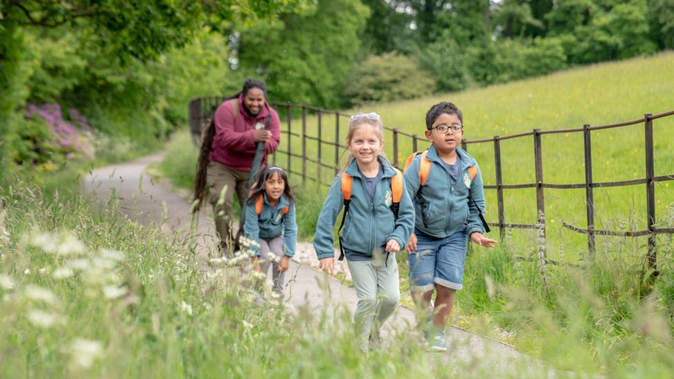 Picture of children in nature with Ranger Hamza