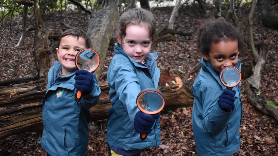 Picture of children in nature with Ranger Hamza