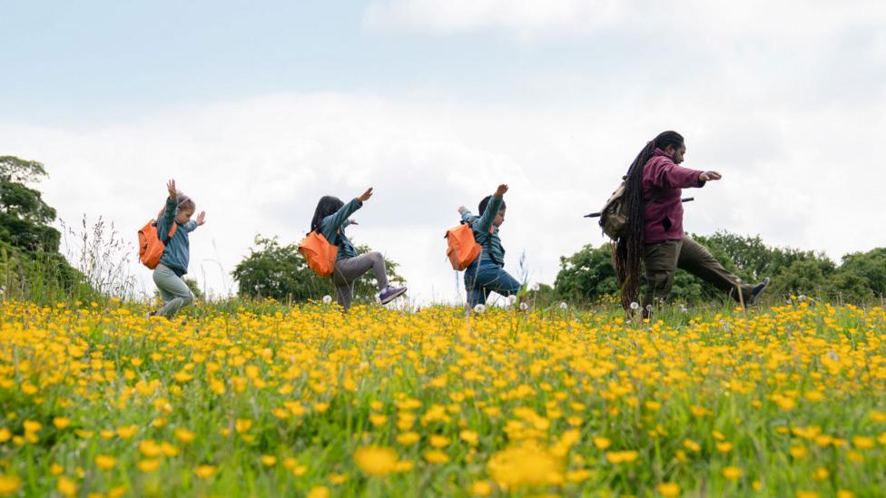 Picture of children in nature with Ranger Hamza