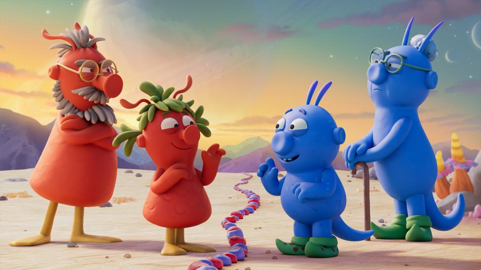 An animated confrontation between a family of blue aliens and a family of red aliens.