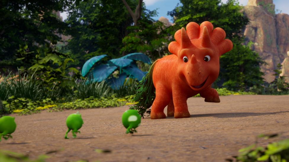 Ginger is looking at the Pea-rexes following her