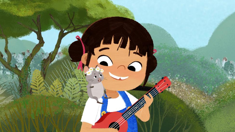 Yukee plays a guitar with a mouse on her shoulder.