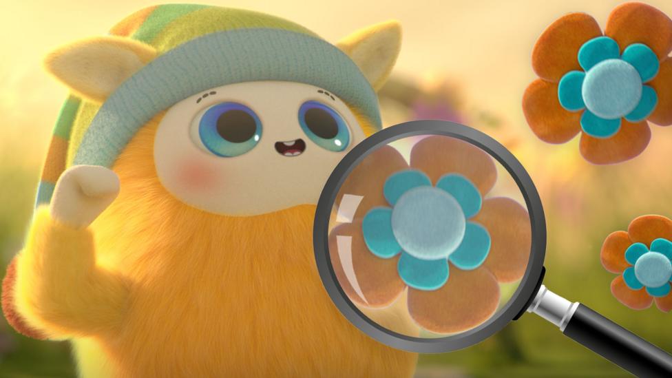 BaBa, a yellow furry character wearing a blue striped hat with wide eyes, looks excited, with large orange and blue flowers floating nearby. A magnifying glass shows the flowers clearly.