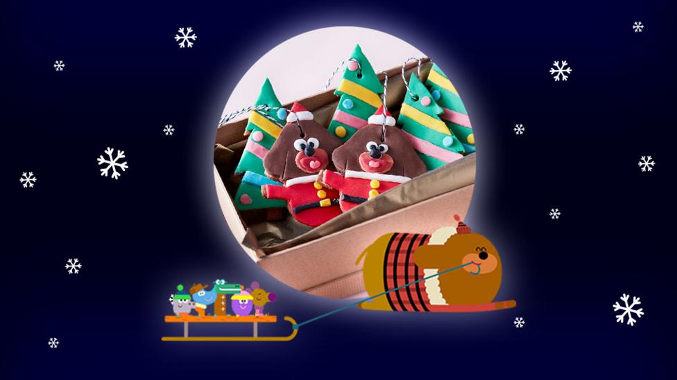 Hey Duggee and Tree Christmas gingerbread cookies with Duggee and squirrels sledging.