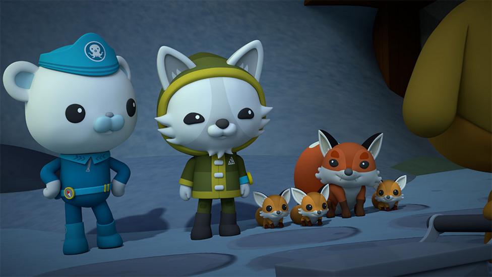 Professor Natquik and Captain Barnacles pictured next to red fox and his little kits.