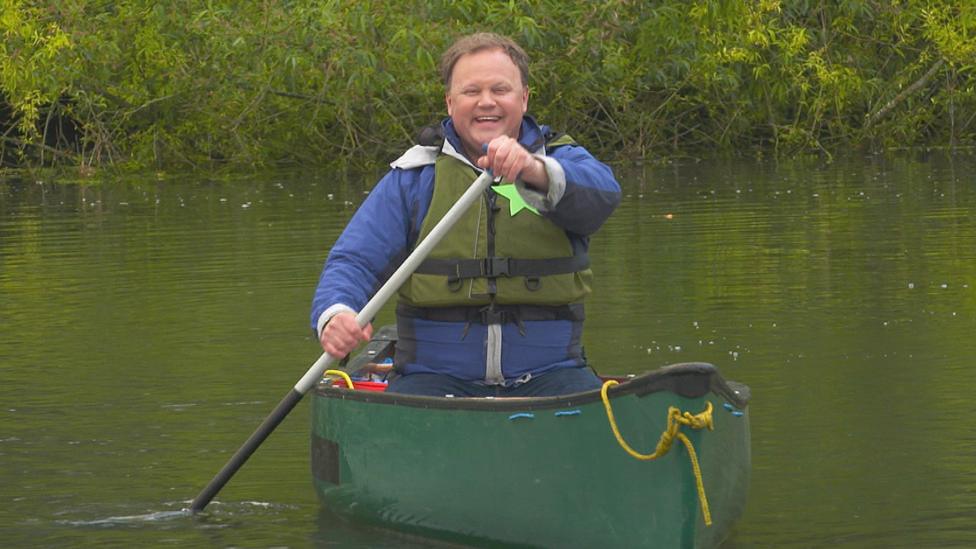 Justin Fletcher from Something Special rowing a small boat
