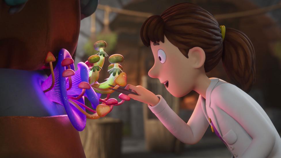 Doctor Princess Pearl, a princess wearing a white doctor's coat, leans forwards, looking amazed at a colony of purple mushrooms growing from someone's belly button!