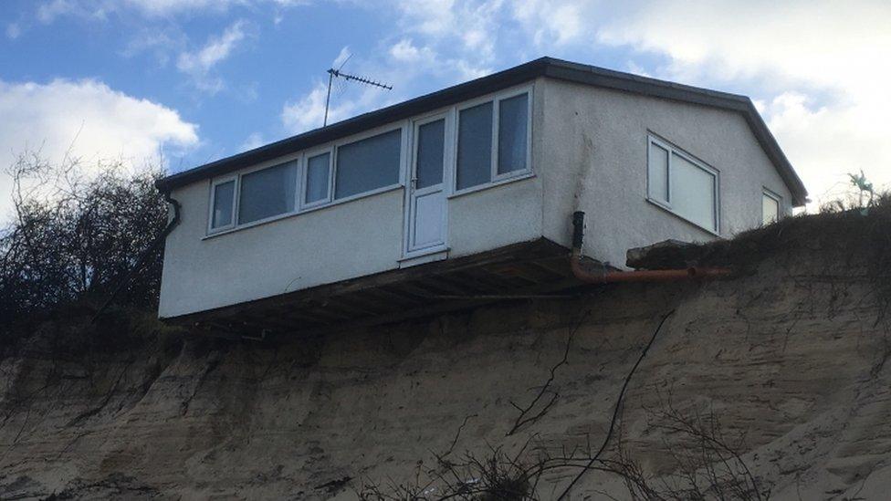 Hemsby house teetering over the sand dune