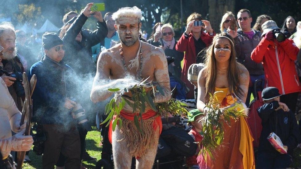 Indigenous Australian performers hold a smoking ceremony to open NAIDOC Week, a national program that celebrates the National Aborigines and Islanders Day Observance Committee in Sydney on July 6, 2015