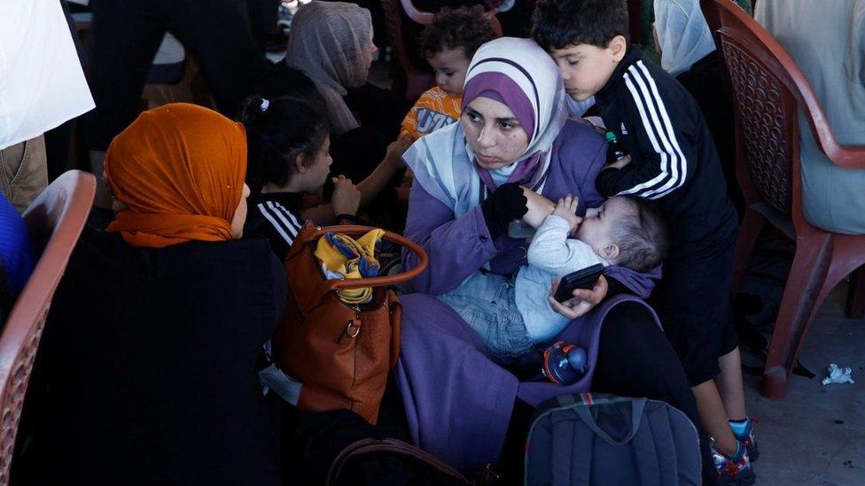 Crowds gather at the Rafah border crossing with Egypt in case it reopens