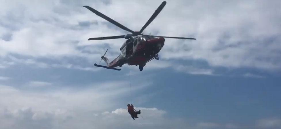 Shaun Gash being winched on board coastguard helicopter