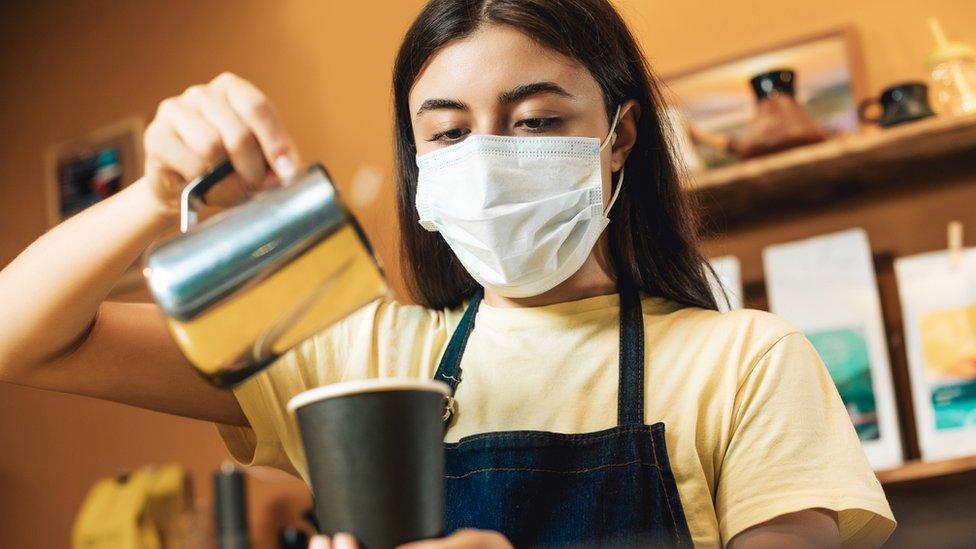 Woman making coffee