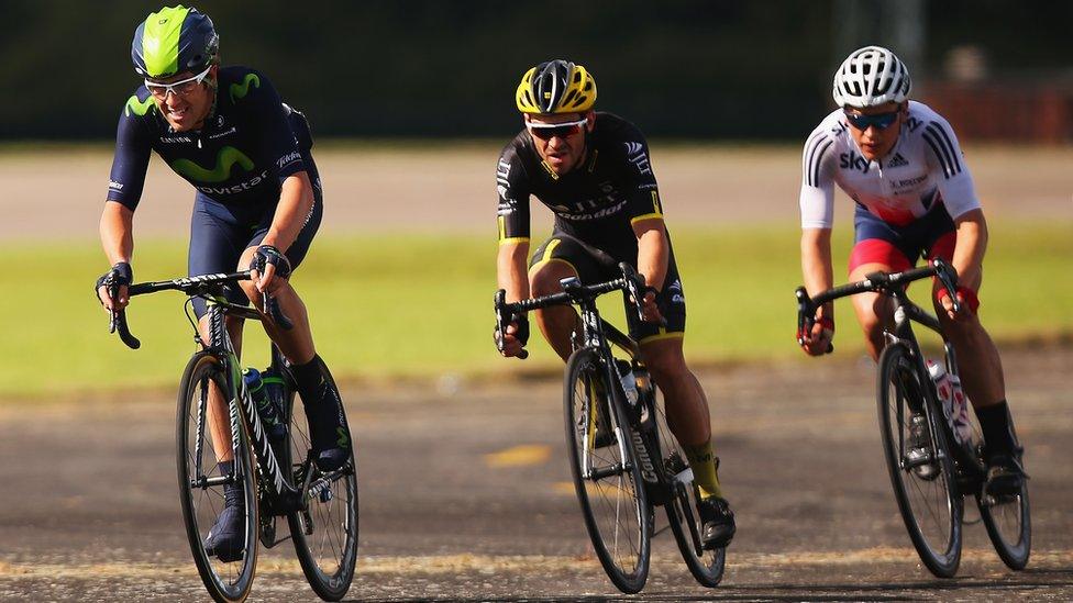 Alex Dowsett of Great Britain and the Movistar Team leads the breakaway group though Wattisham Airfield on stage seven of the 2015 Tour of Britain