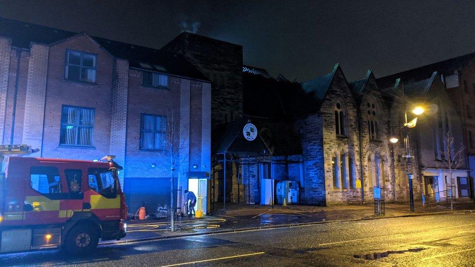 A fire engine outside the Belfast Multi-Cultural Association building, the scene of the fire