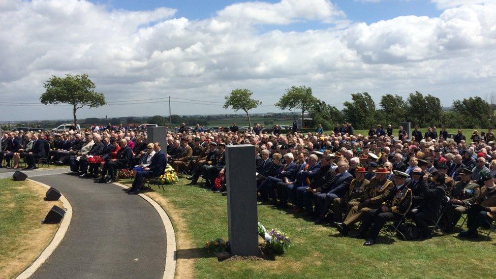 Crowds gathered to pay their respects to those who died