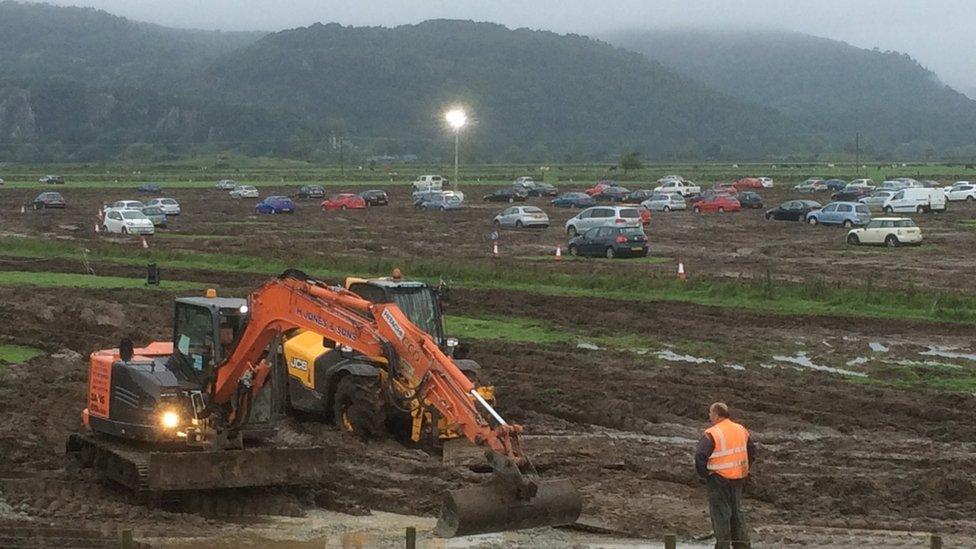 The festival's park and ride car park was built on a flood plain