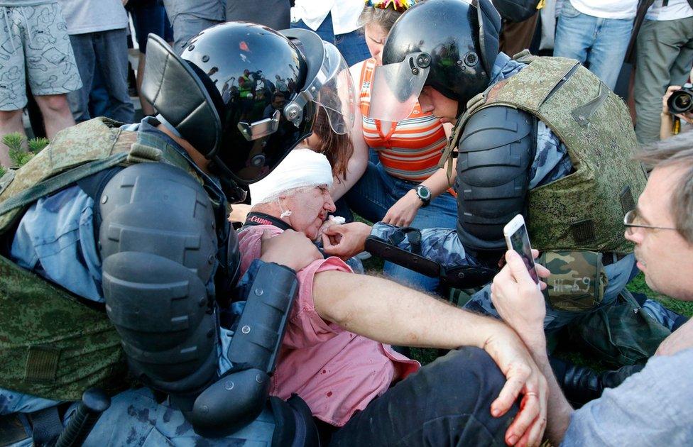 Police and protesters in Moscow, 27 July