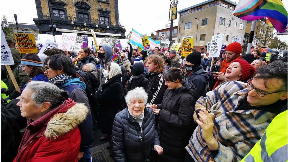 Counter protesters stand outside The Great Exhibition pub in East Dulwich.