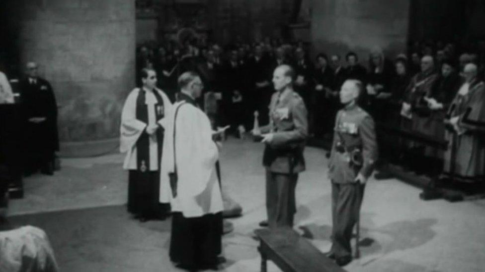 Original stone cross handed to Gloucester Cathedral in 1953 with Col Carne looking on