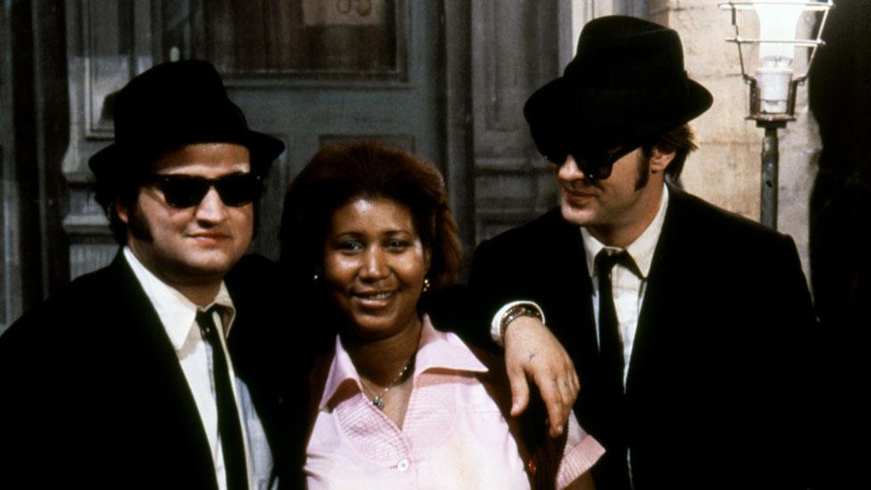 Aretha Franklin with John Belushi and Dan Aykroyd on the set of The Blues Brothers