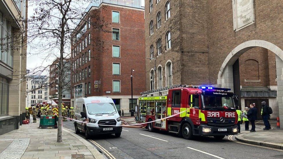 Image showing a fire engine and firefighters at the rear of the Old Bailey